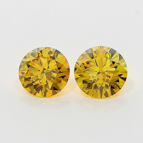 0.57 Carat Fancy Vivid Orangy  Yellow  BR SI2 GIA