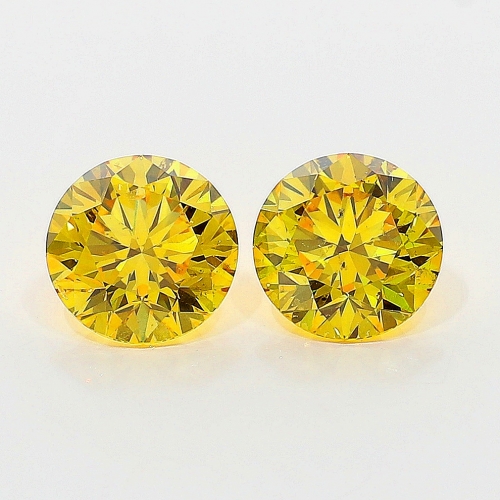 0.54 Carat Fancy Vivid Orangy  Yellow  BR SI2 GIA