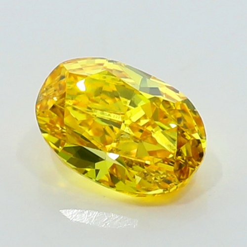 0.40 Carat Fancy Vivid Orangy  Yellow OV SI1 GIA