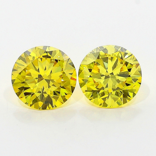 0.7 carat Round Brilliant VS2 Fancy Vivid Yellow